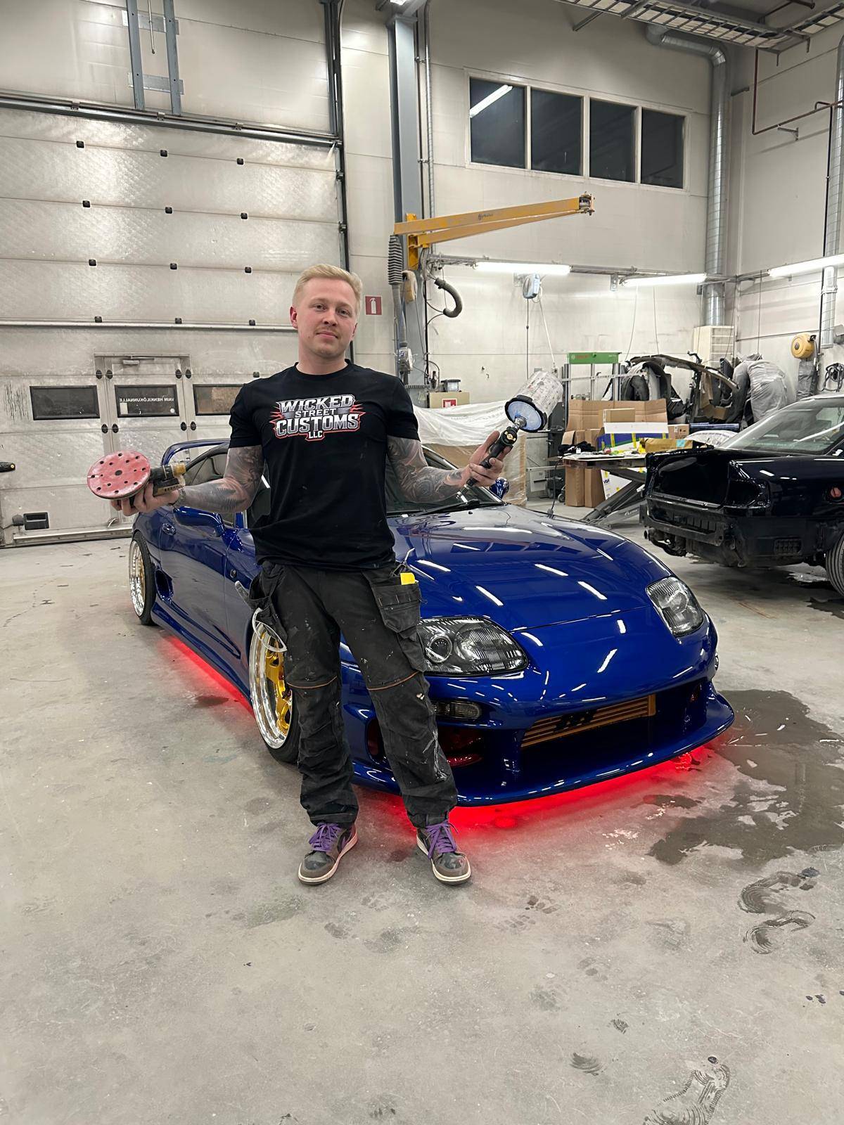 European car repair Katy TX – mechanic servicing BMW