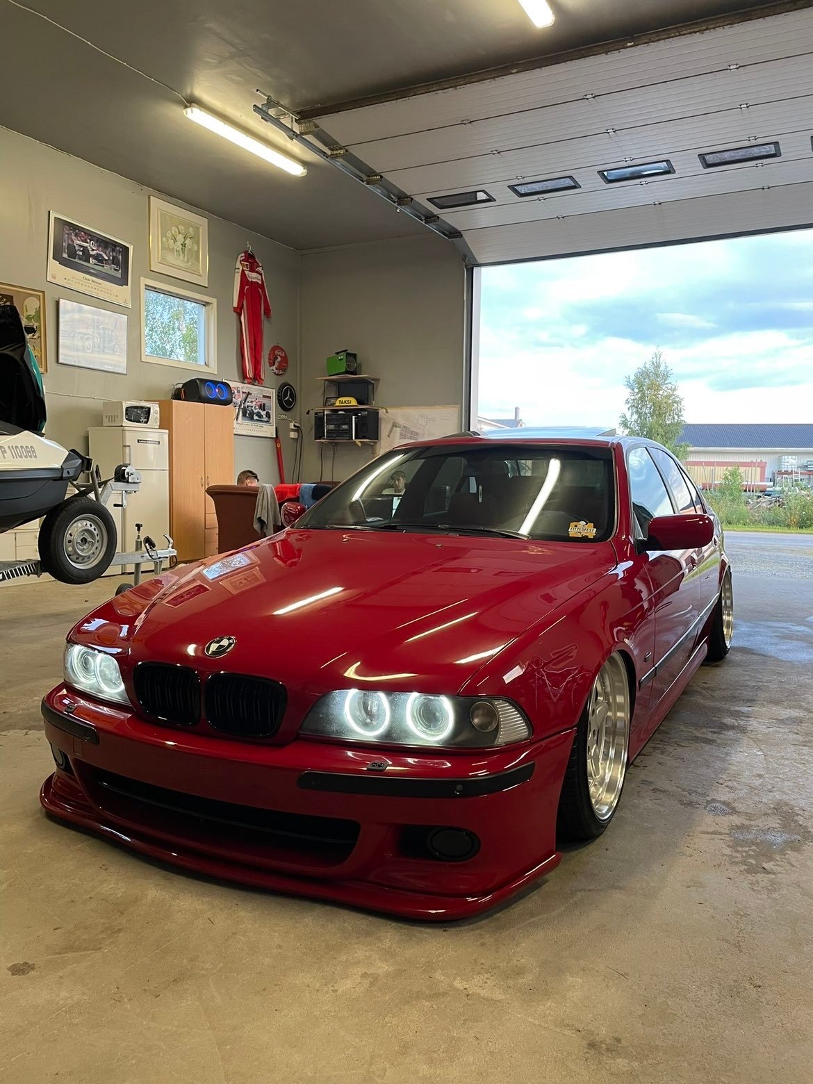 Red BMW 5 Series E39 in the showroom &ndash; Wicked Street Customs