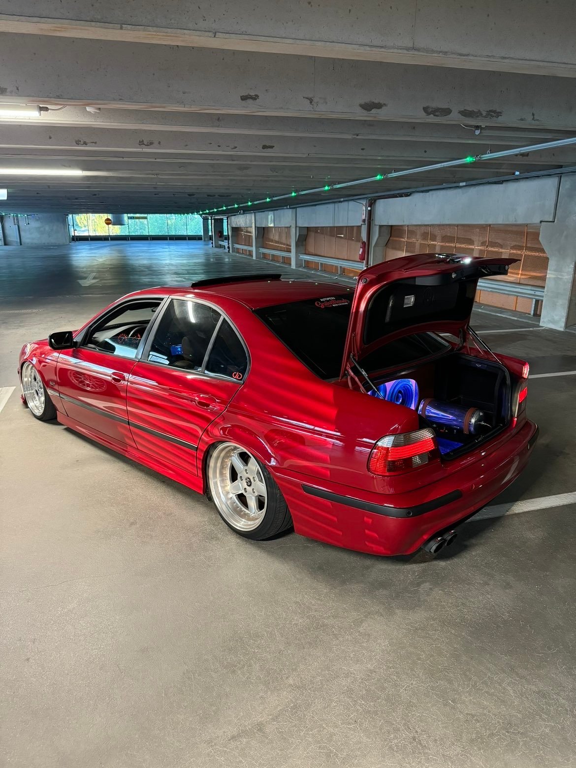 Red BMW 5 Series E39 with trunk audio and battery setup &ndash; Wicked Street Customs