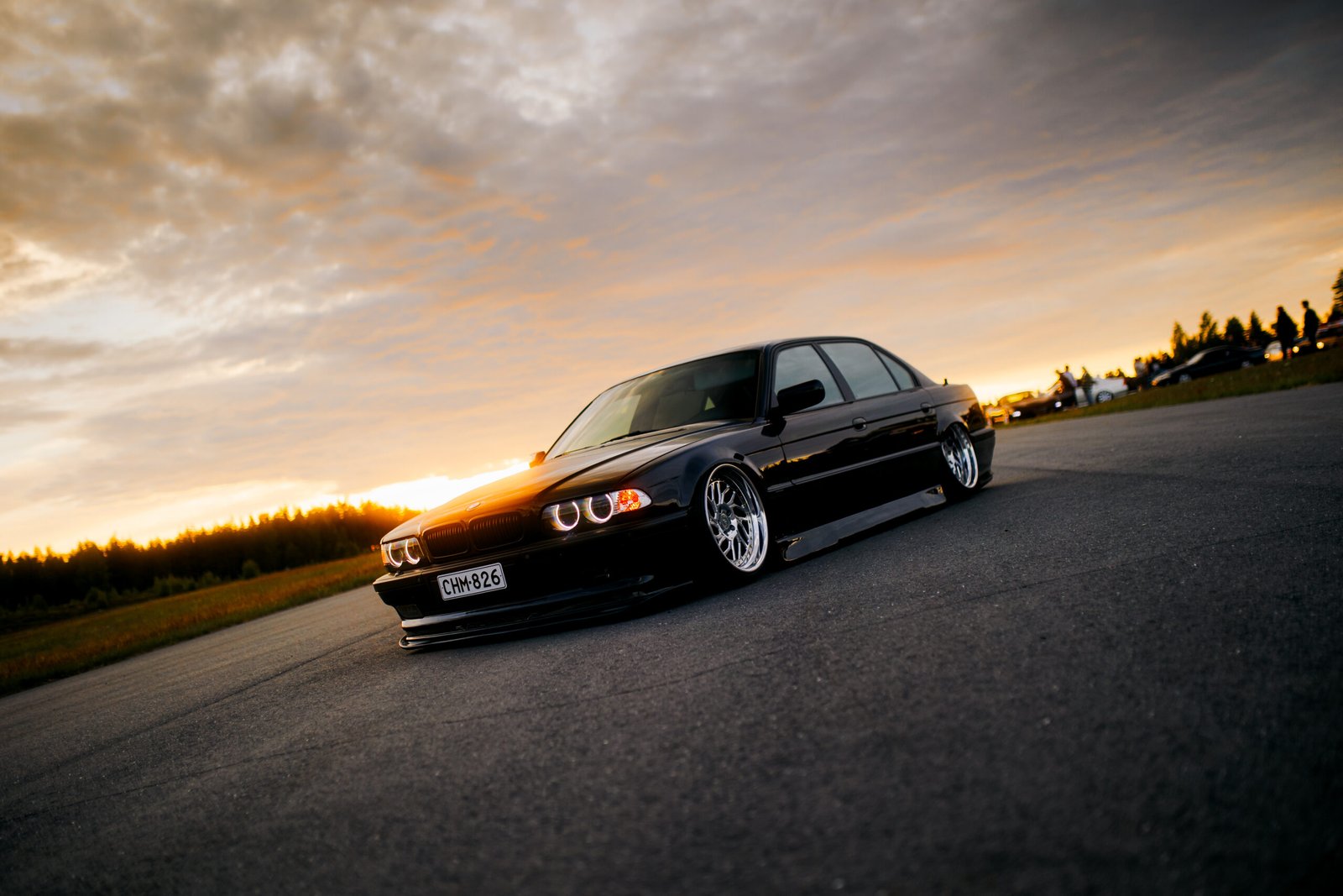 Black BMW 5 Series E39 on the road at sunset &ndash; Wicked Street Customs