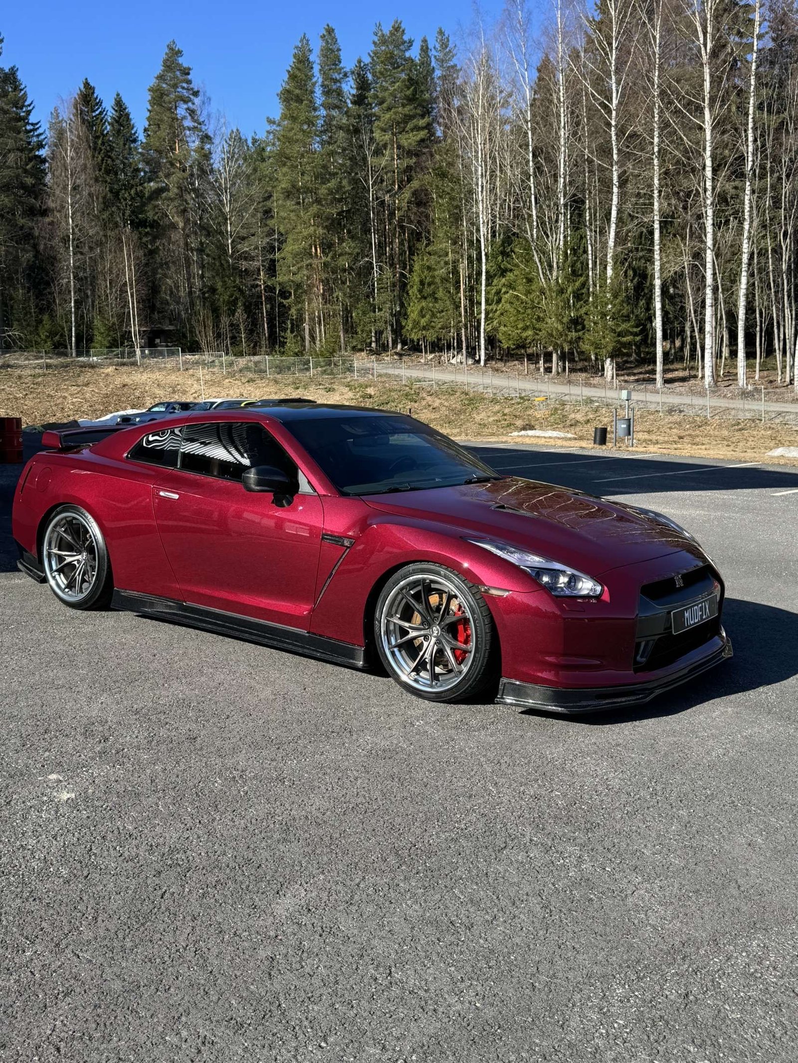 Lowered dark red Nissan GT-R &ndash; Wicked Street Customs