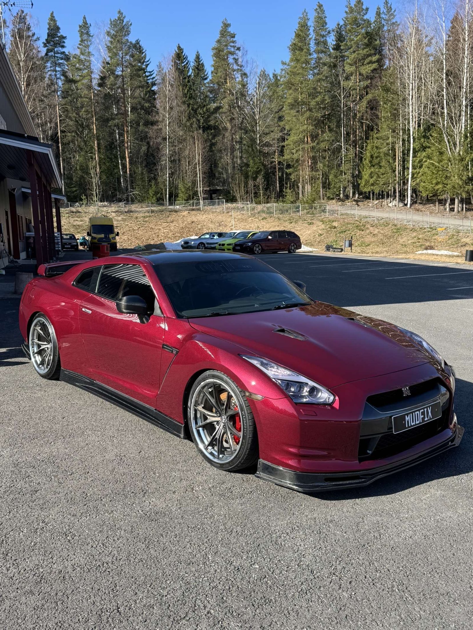 Dark red Nissan GT-R on the road &ndash; Wicked Street Customs