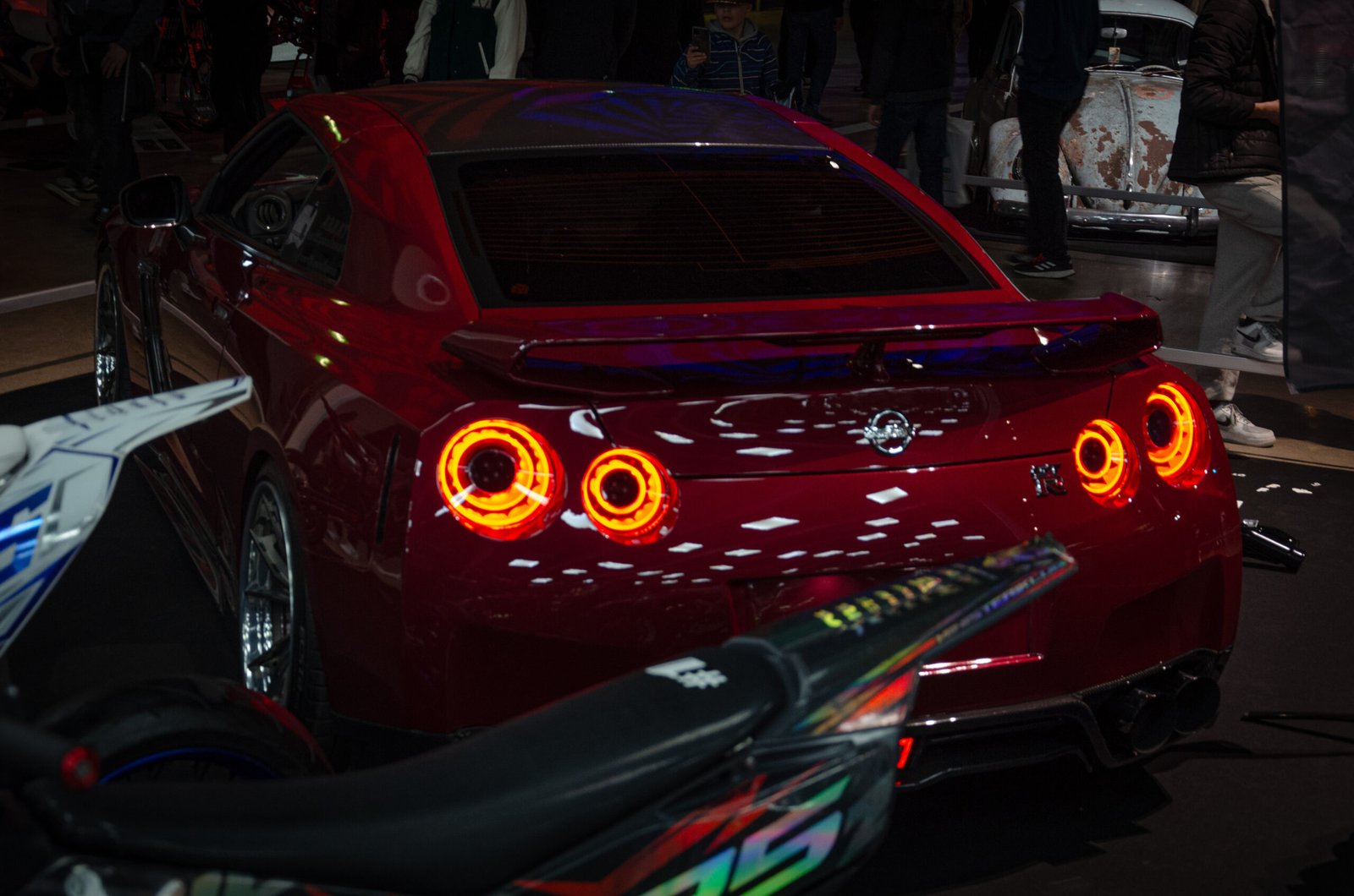 Red Nissan GT-R rear with glowing taillights &ndash; Wicked Street Customs