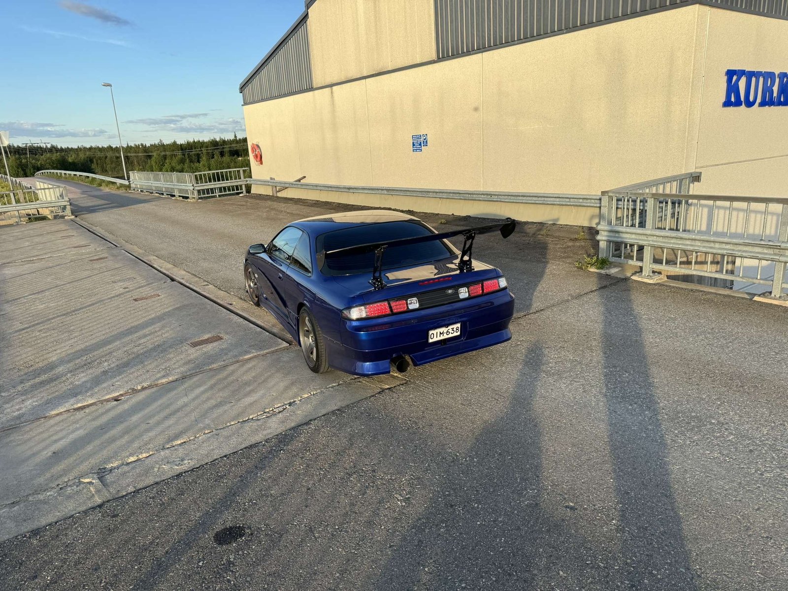 Blue Nissan Silvia S14 with a rear wing &ndash; Wicked Street Customs