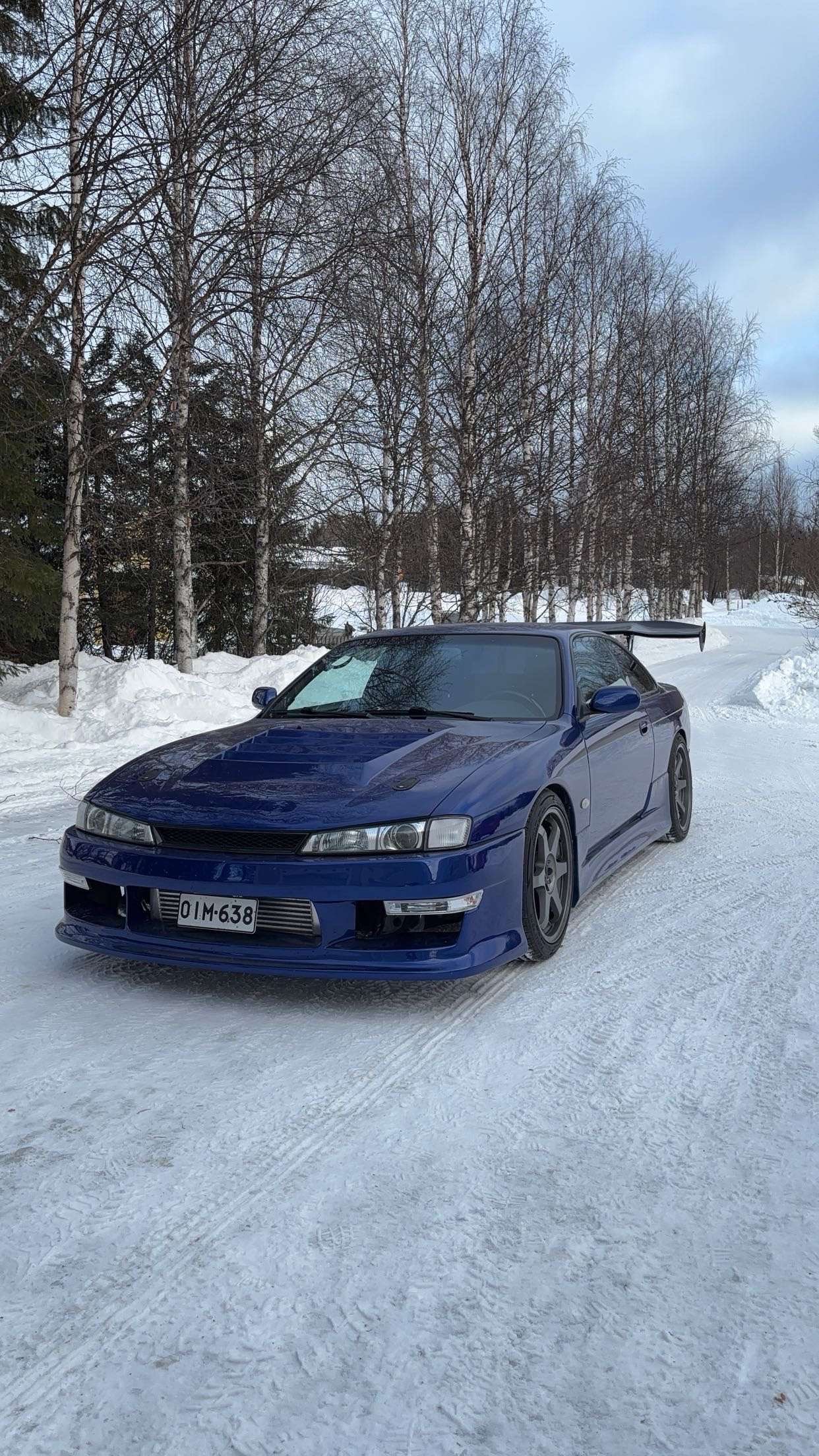 Blue Nissan Silvia S14 front in the snow &ndash; Wicked Street Customs